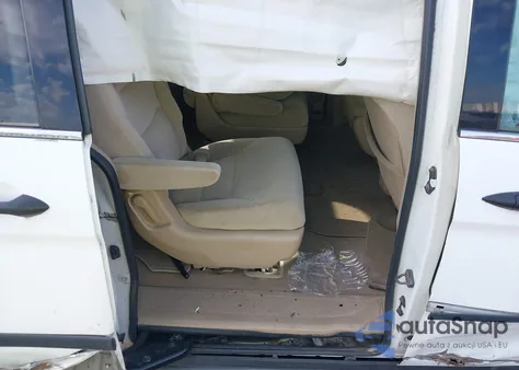 2010 Honda Odyssey Lx z USA, uszkodzony, nr VIN 5FNRL3H21AB037857